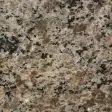 Light brown with dark clusters, granite color swatch